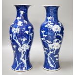 Two 19th century Chinese blue and white prunus vases, 31cm