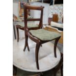 Six Regency mahogany cane and drop in seat dining chairs (four plus two)