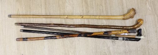 A small bundle of three walking canes