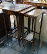 A graduating nest of three rectangular chinoiserie lacquer tea tables, width 46cm, depth 33cm,