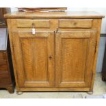 A late18th century continental fruitwood two drawer side cabinet, width 128cm, depth 47cm, height