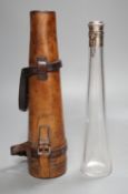 A Victorian silver mounted travelling glass flask in fitted brown leather case