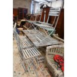 A pair of rectangular painted metal slatted garden tables, each width 86cm, depth 87cm, height