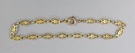 A modern 750 yellow metal pierced link bracelet, 18cm, 3.7 grams.