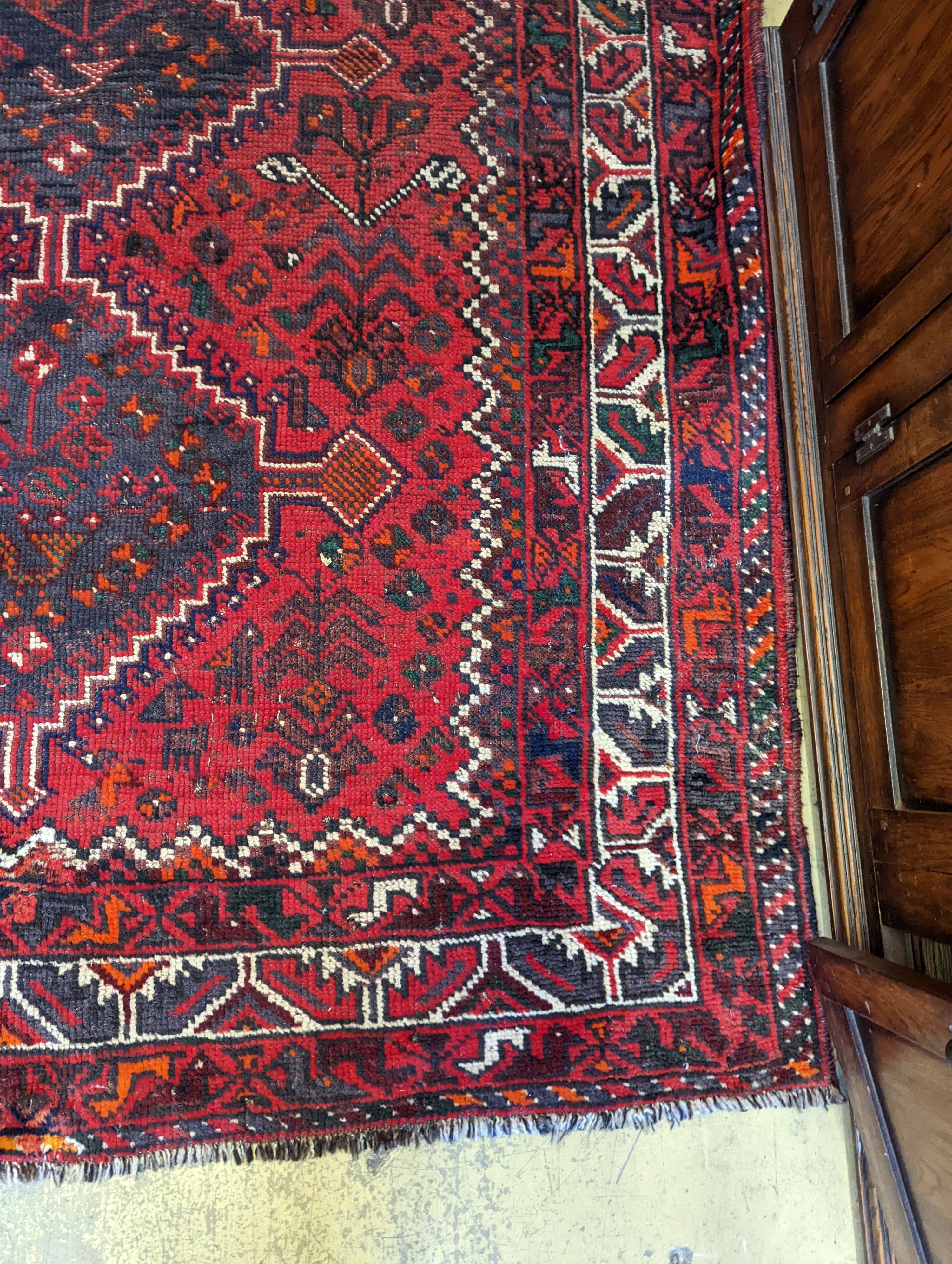 A Caucasian design red ground rug, 200 x 160cm - Image 3 of 5