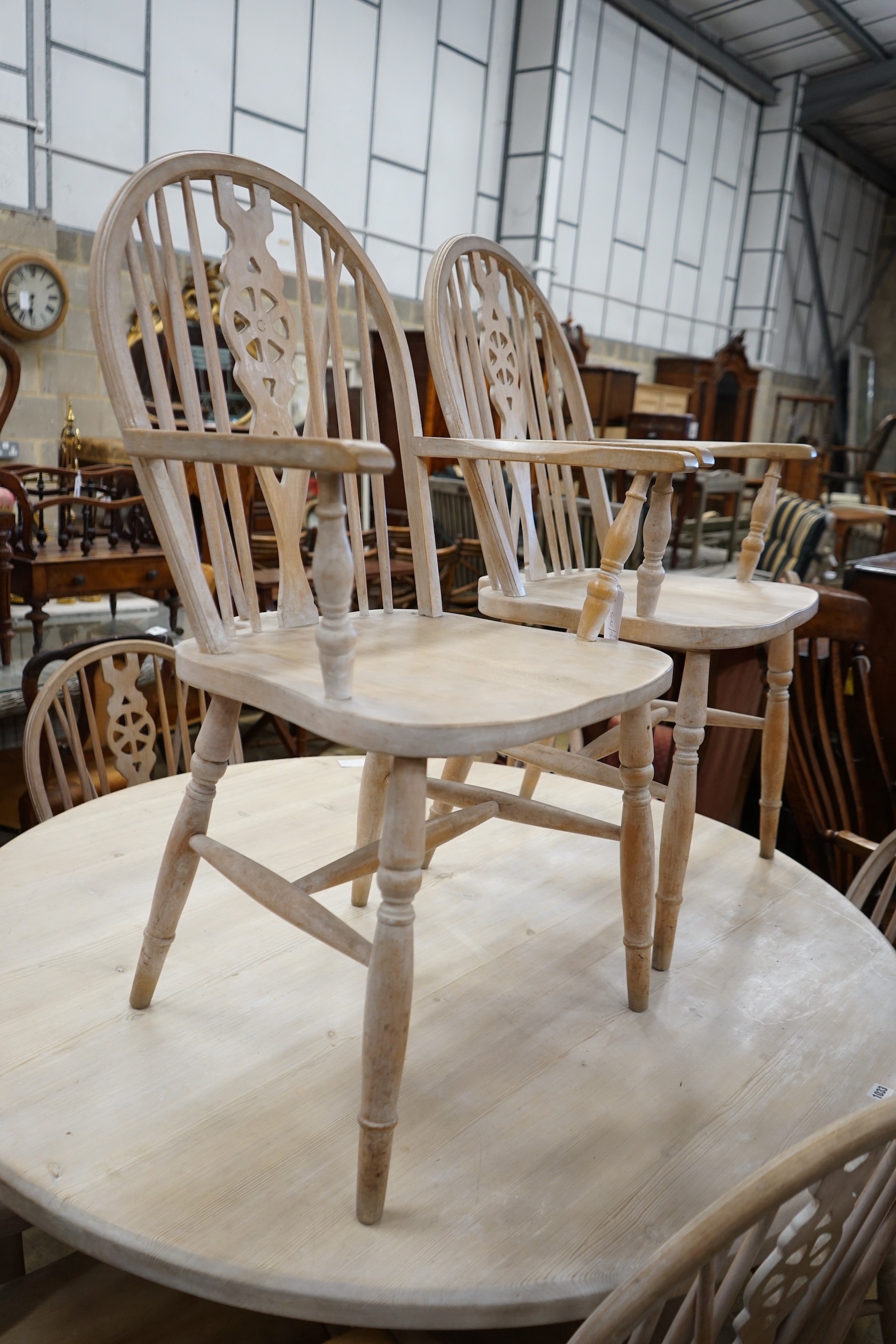 A set of eight Victorian style limed beech Windsor wheelback elbow chairs - Image 3 of 4