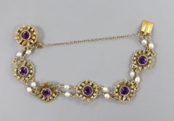 A 14ct, amethyst and baroque pearl set flower head bracelet, 16cm, gross weight 14.8 grams.