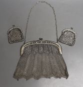 A chain mail metal evening bag and two similar purses.