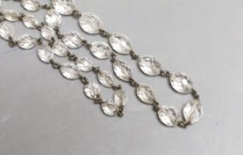A white metal and facetted rock crystal necklace, 138cm.