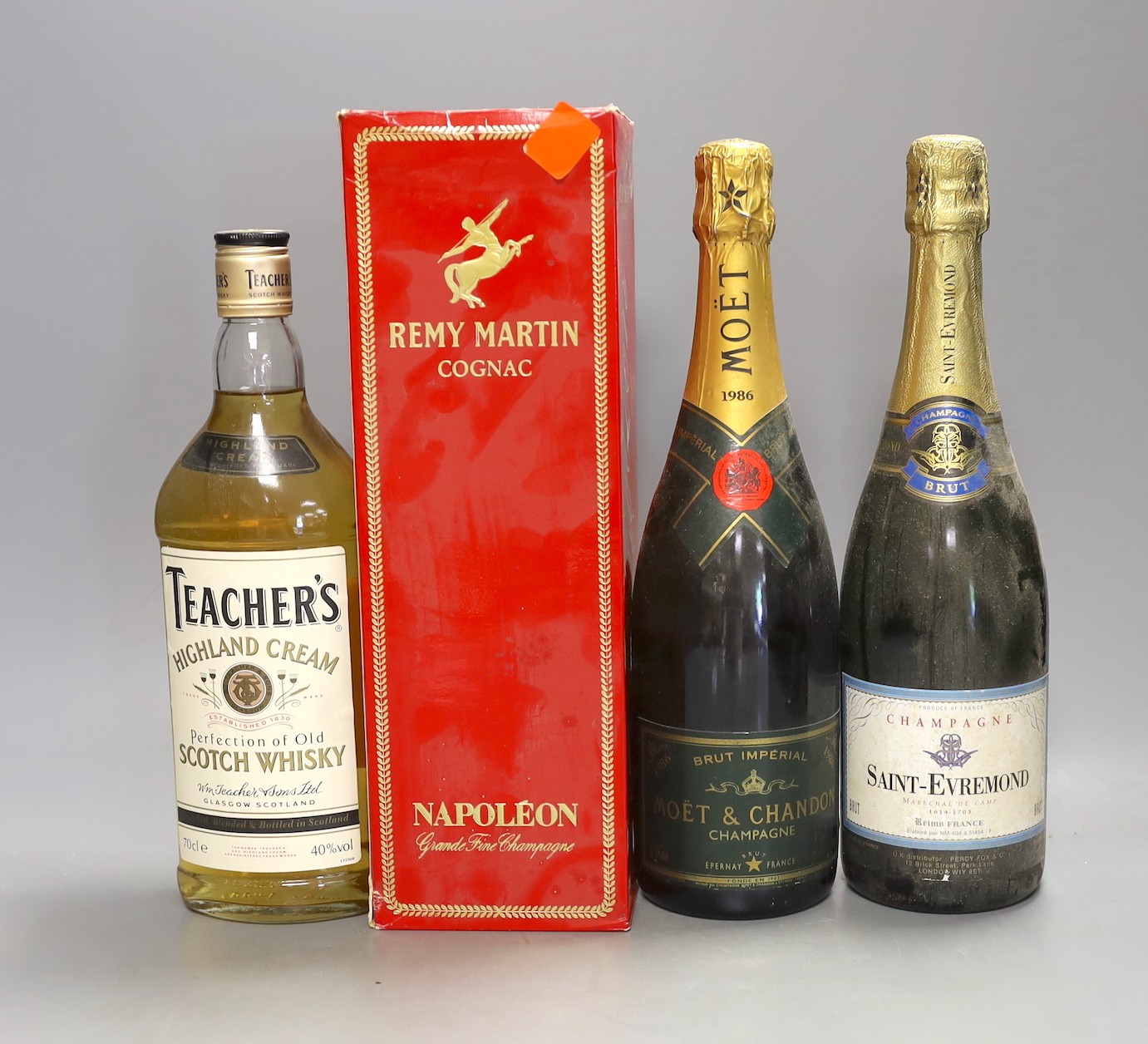 One bottle of 1986 Moët and Chandon Brut champagne, together with a bottle of Saint-Evremond