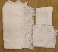A group of lace table cloths