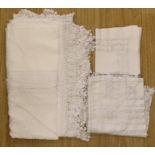 A group of lace table cloths