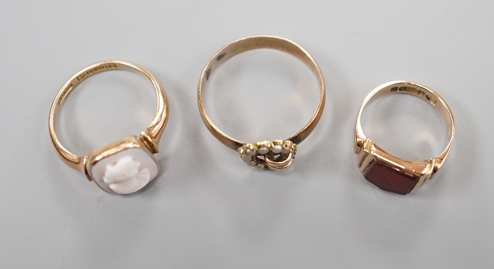 A late Victorian 9ct gold and carnelian set signet ring, size G and tow later 9ct rings including - Image 2 of 2