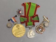 Five military badges and medals and buttons Including a Panorama de Paris medal 1878, India Princely