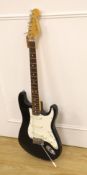 A 1980’s Fender Stratocaster, U.S.A. Serial No. E451951, lace sensor pickups with hard flight case,