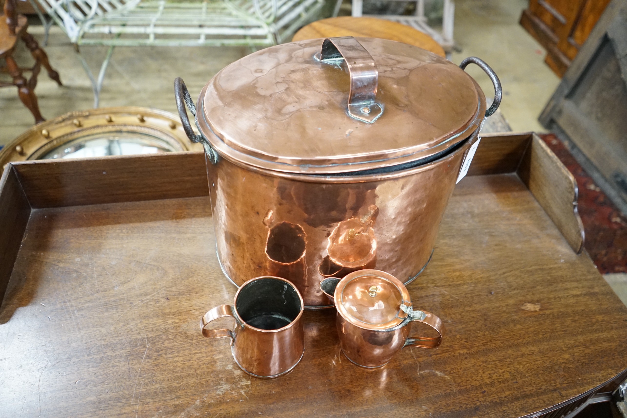 A Victorian oval copper lidded cauldron, height 33cm together with a Victorian copper measure and - Image 2 of 2