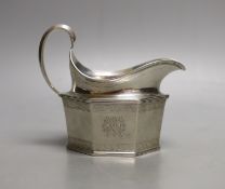 A George V silver hexagonal cream jug, London, 1930, 7oz.