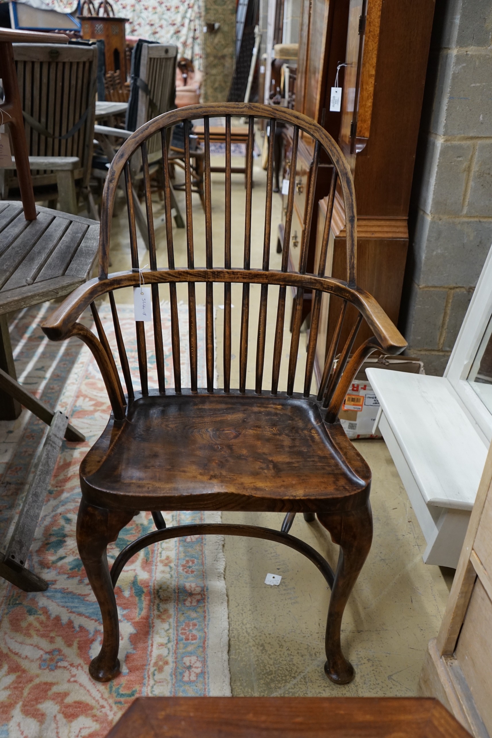A Windsor elm and beech comb back elbow chair, width 59cm, depth 39cm, height 102cm - Image 2 of 2