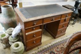 A mid 19th century oak kneehole desk, length 124cm, depth 63cm, height 78cm