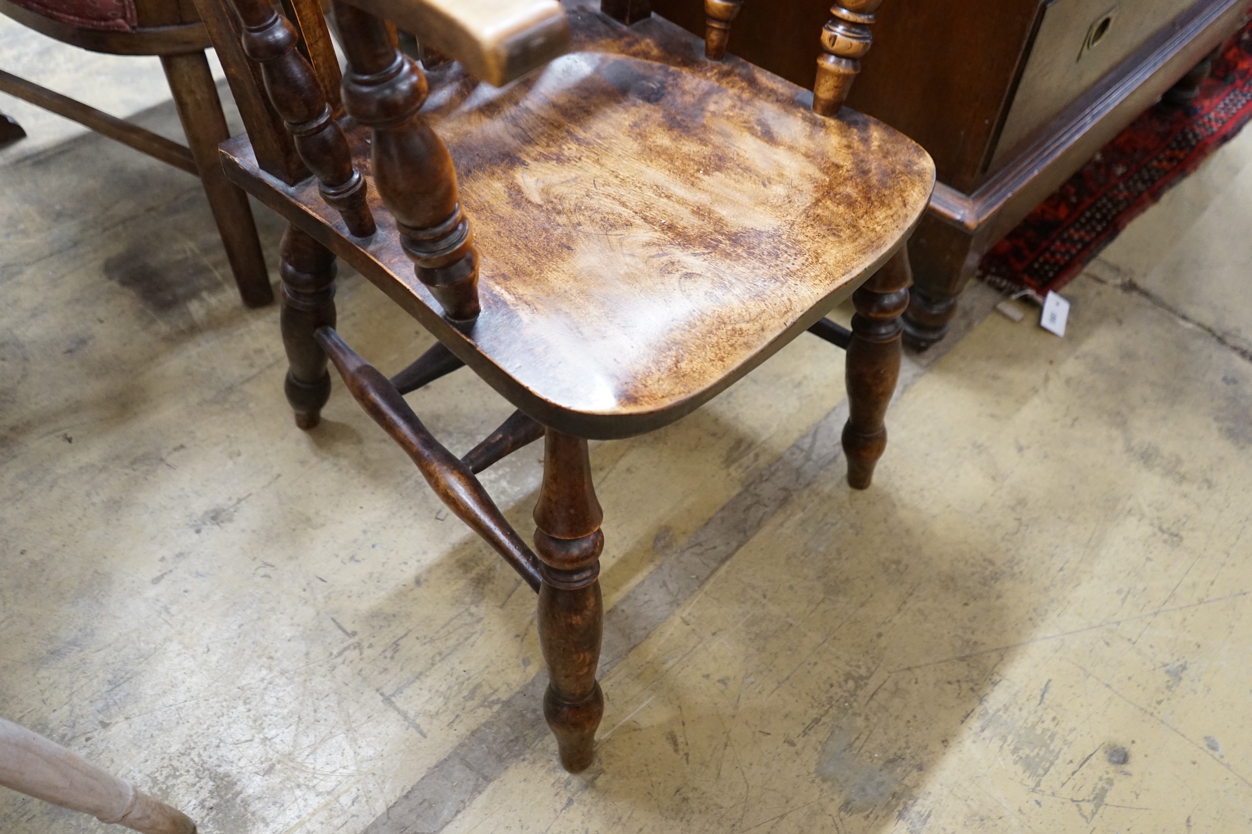 A Victorian elm and beech Windsor lathe back armchair, width 58cm, depth 46cm, height 115cm - Image 2 of 3