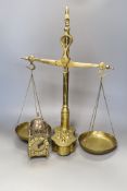A pair of Victorian beam scales, 55cm tall, and a Smith & Day timepiece
