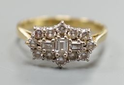 A modern 18ct gold and diamond cluster dress ring, size P, gross weight 4.2 grams, set with round