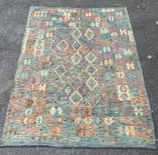 An Anatolian design polychrome flatweave Kilim carpet, 249 x 177cm 249cm x 177cm