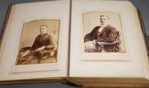 A late Victorian Morocco leather album of cabinet card photo portraits