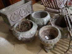 A rectangular reconstituted stone garden planter on twin block supports, width 70cm, a hexagonal