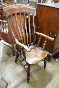A Victorian elm and beech Windsor lathe back armchair, width 58cm, depth 46cm, height 115cm