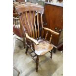 A Victorian elm and beech Windsor lathe back armchair, width 58cm, depth 46cm, height 115cm