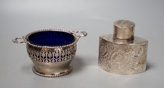 A late Victorian repousse silver tea caddy, Birmingham, 1899, height, 86mm and a later silver two