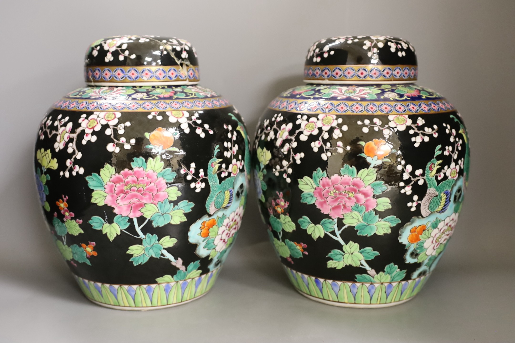 A pair of Japanese famille noire jars and covers, early 20th century, 27cm - Image 2 of 5