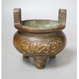 A Chinese bronze tripod Islamic market censer, Xuande mark - 13cm tall