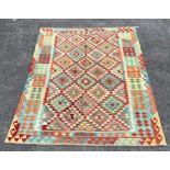 An Anatolian style polychrome Kilim flatweave carpet, 254 x 185cm