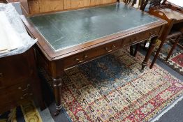 A Victorian mahogany two drawer library table, width 136cm, depth 74cm, height 74cm