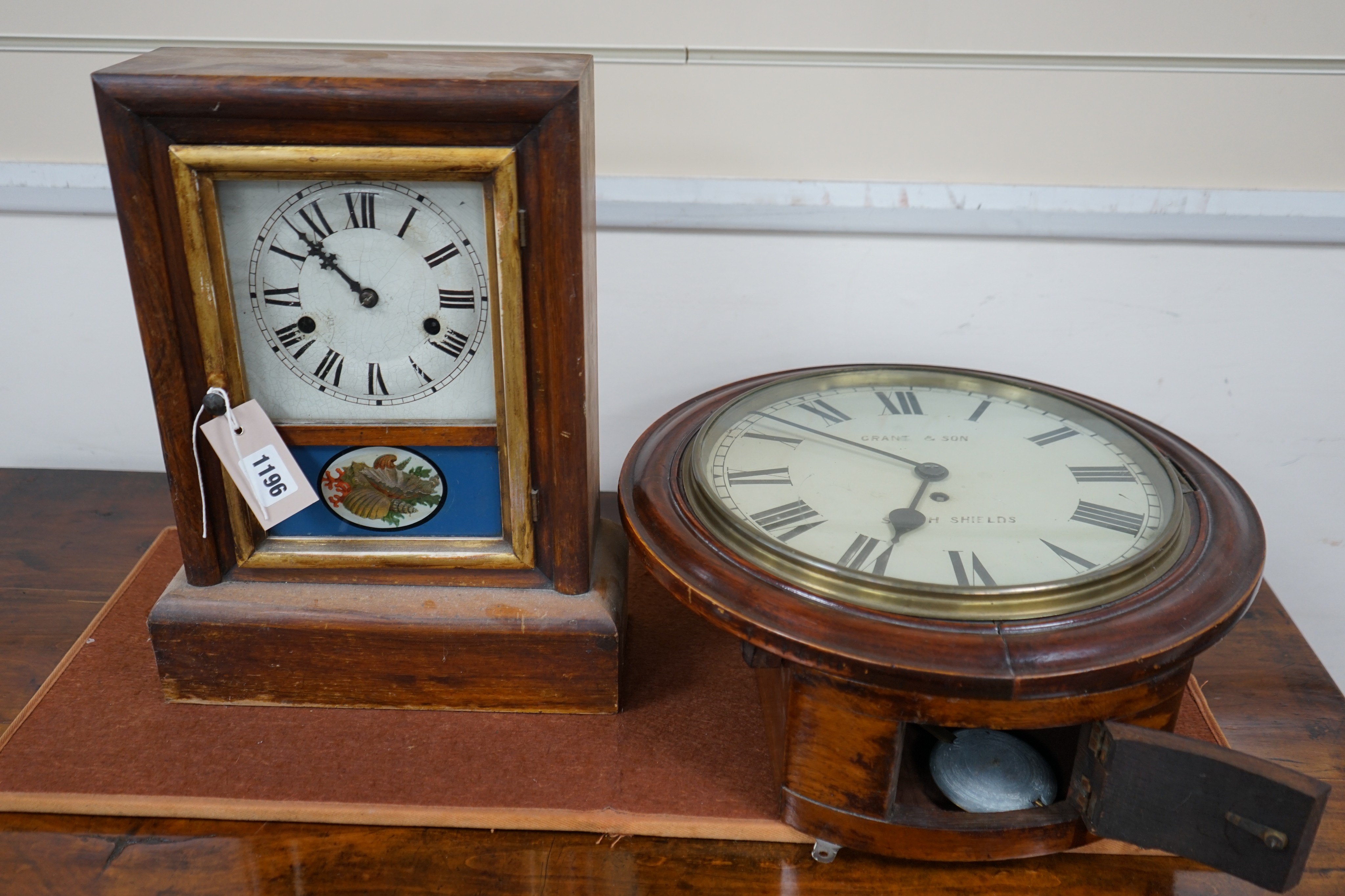 A Victorian mahogany circular wall dial with later movement, diameter 40cm together with an American