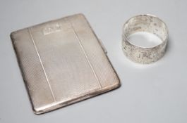 A silver cigarette case and a silver napkin ring.
