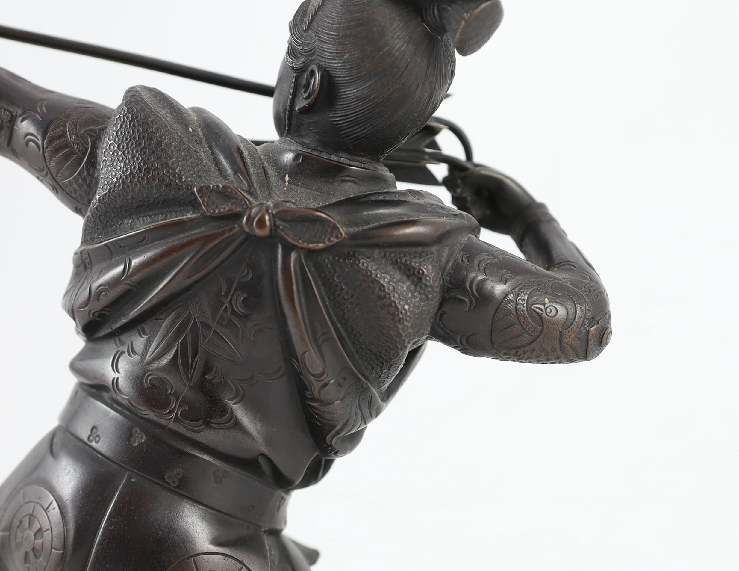 A Japanese bronze figure of a kneeling archer, Meiji period, signed to a raised tablet ‘…zan’ 40 - Image 5 of 7