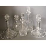 Two Waterford glass decanters, and three other decanters