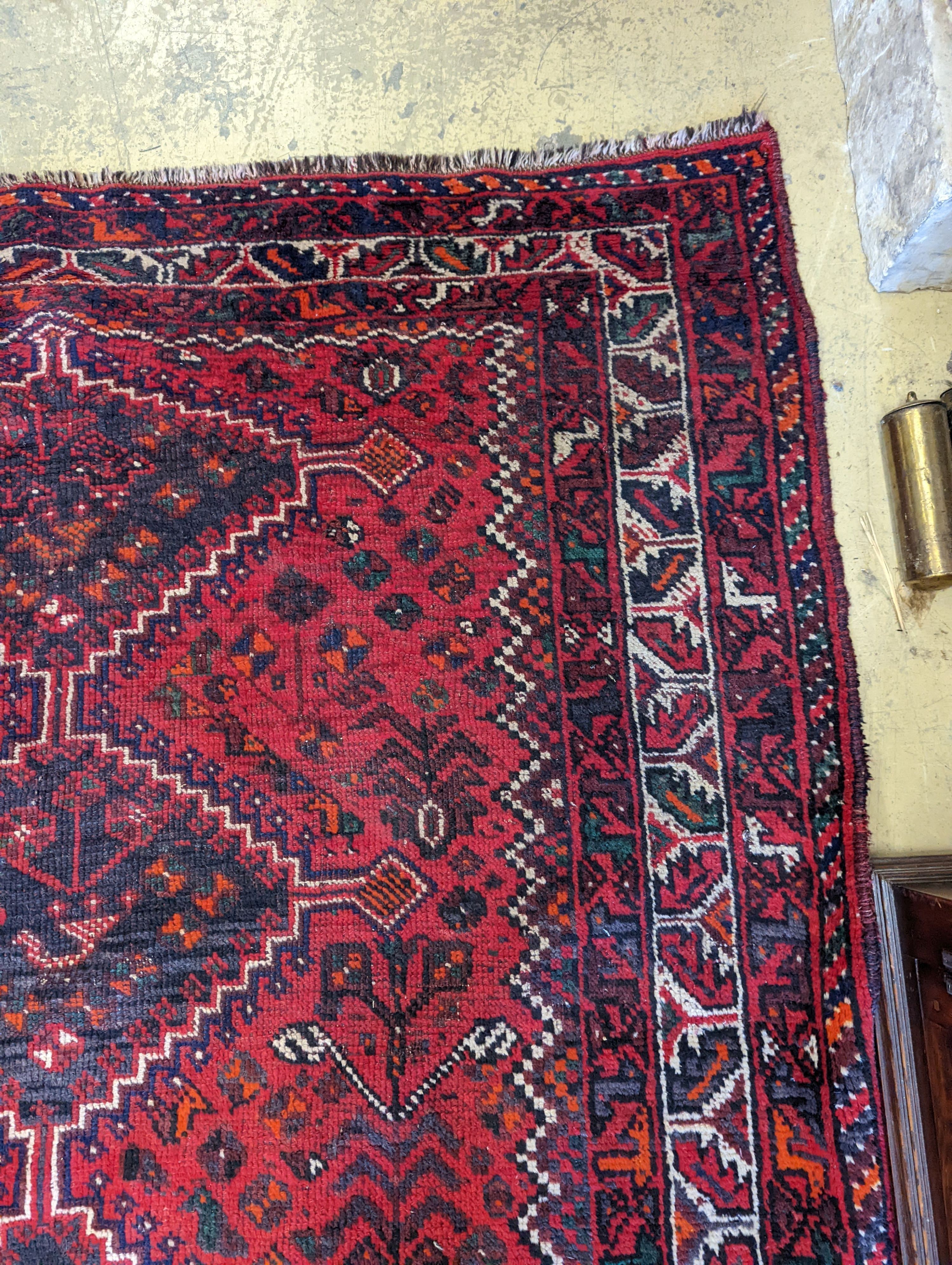 A Caucasian design red ground rug, 200 x 160cm - Image 4 of 5
