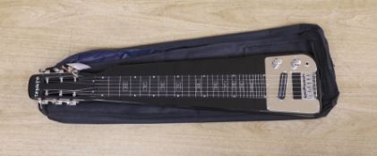 A Tenaro lap steel guitar,74 cms long.