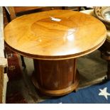 An Art Deco style circular walnut Patent Pop-up drinks table, diameter 80cm, length 92cm extended