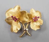 A gold and ruby cluster set double flower head brooch, indistinctly signed, 4cm, gross weight 12.5