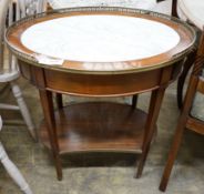 A French oval mahogany marble top two tier centre table, width 68cm, depth 48cm, height 75cm