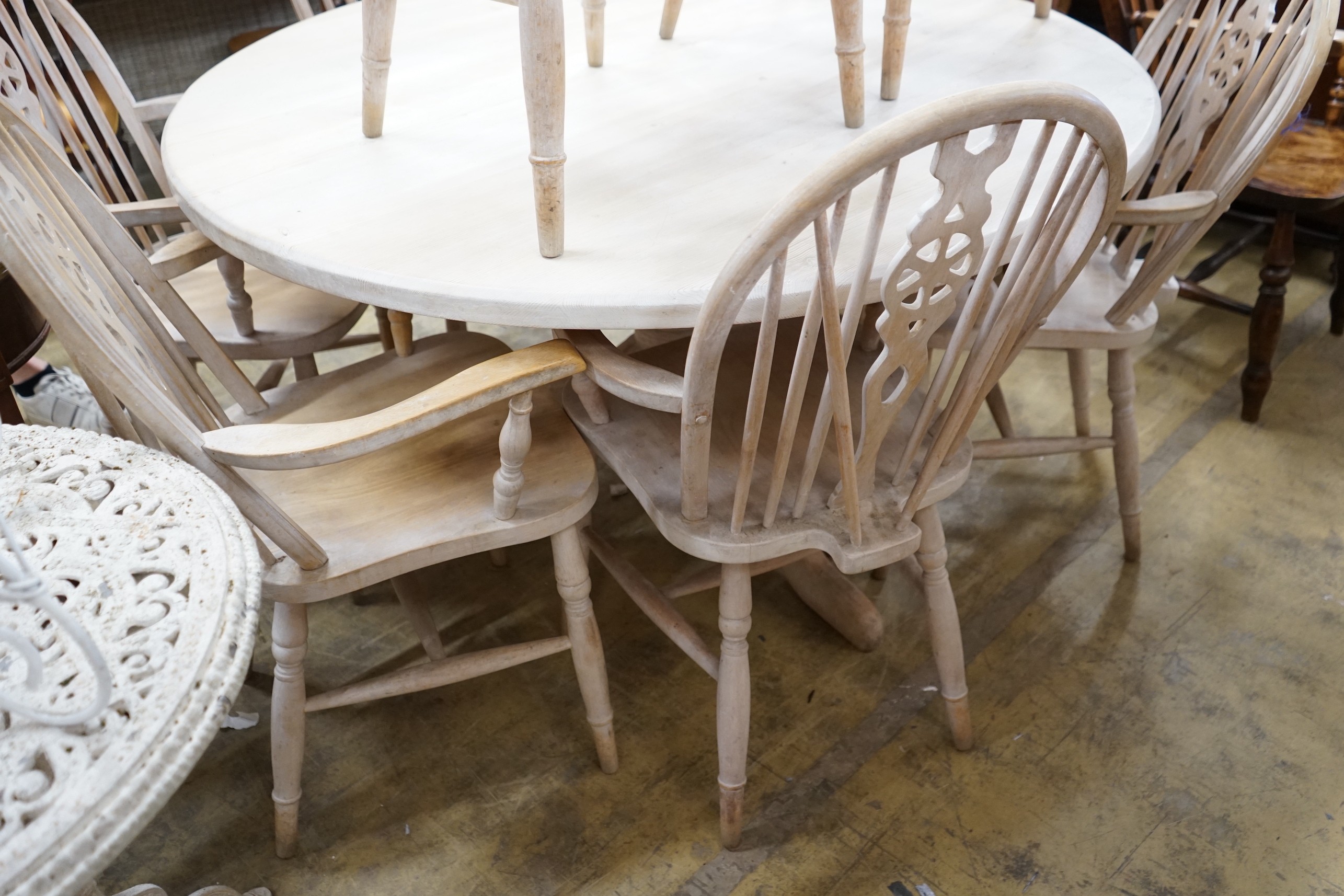 A set of eight Victorian style limed beech Windsor wheelback elbow chairs - Image 4 of 4