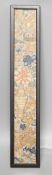 A Chinese framed embroidered floral panel - 53 x 8cm