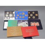 A group of UK Royal Mint BU year sets.