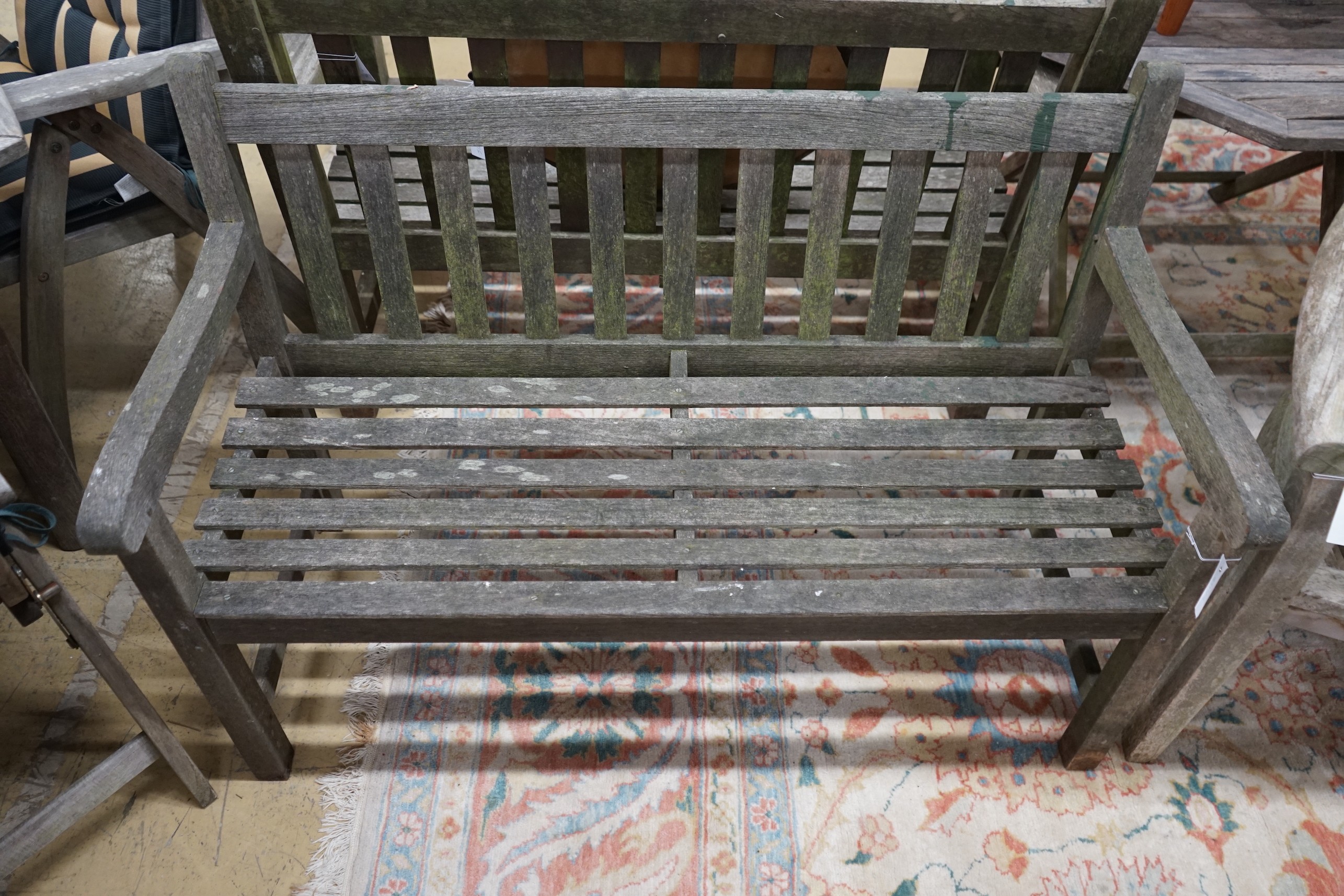 A weathered teak garden bench, length 122cm, depth 54cm, height 83cm - Image 2 of 2