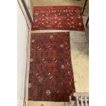 Two Tekke red ground rugs, larger 136 x 94cm